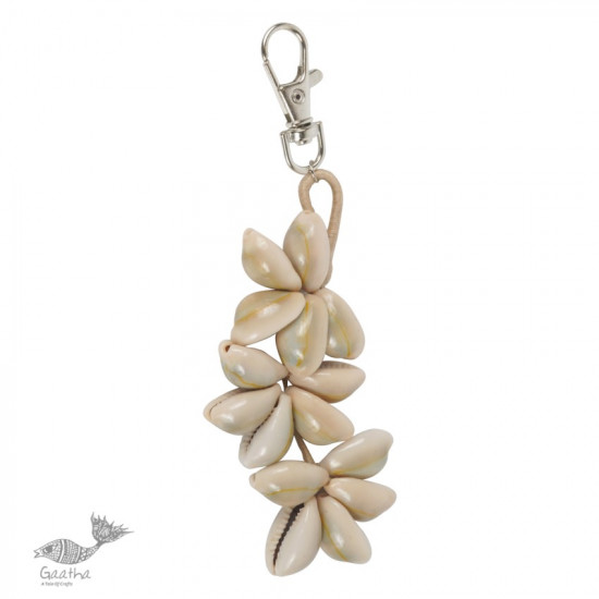 shop online handmade cowrie jute hand bag charm / key chain