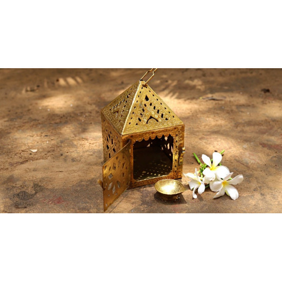 handmade brass hanging lamp with diya