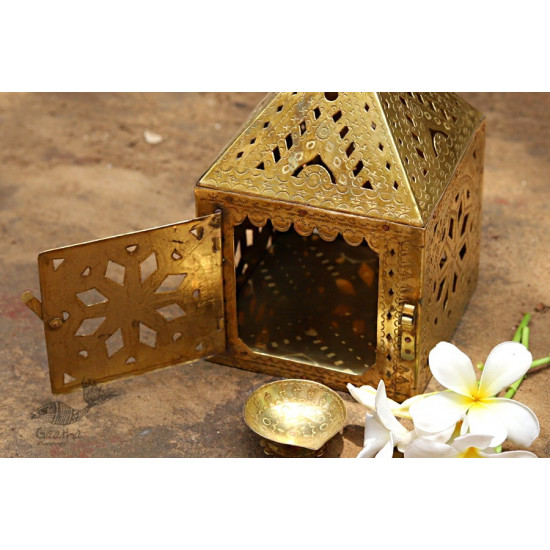 handmade brass hanging lamp with diya