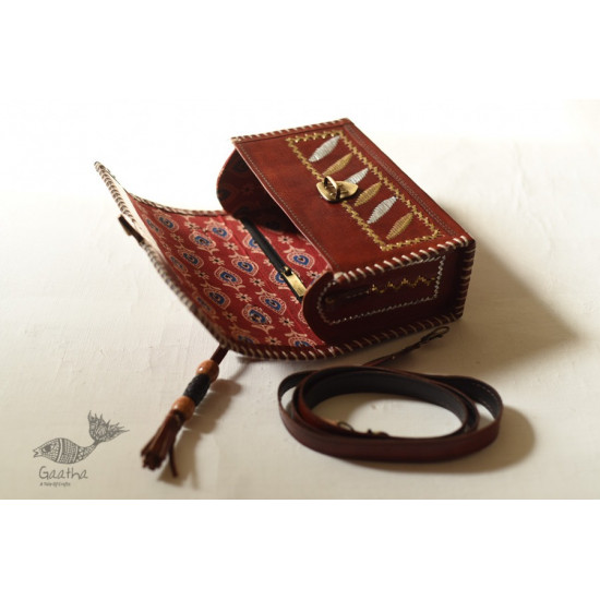 shop Kutchi Leather Sling Handbag