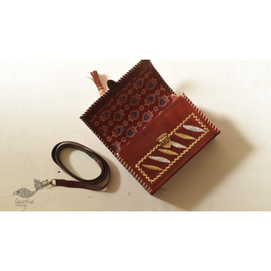 shop Kutchi Leather Sling Handbag