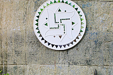 Home And Living | Handmade ~ Kutch Lippan Mud Work Swastik symbol - white