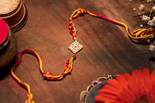 Dhokra Brass ❂ Handmade Rakhi - Red & Yellow Thread