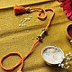 shop handmade dhokra brass rakhi - Pila Dhaga