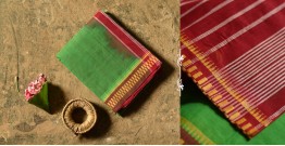 Iravati .  इरावती  ❅ Handwoven Narayanpet Pure Cotton Green Saree with Red Pallu