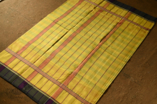 Iravati .  इरावती  - Narayanpet Handwoven Yellow Saree With Green Border