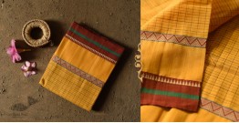 Iravati .  इरावती  - Narayanpet Handloom Cotton Yellow Saree With Red Border
