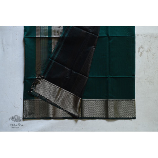 maheshwari handwoven silk dark green saree with golden border