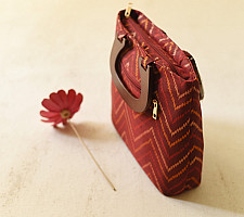 Dots & weaves ~ Patola Hand Bag  | Maroon