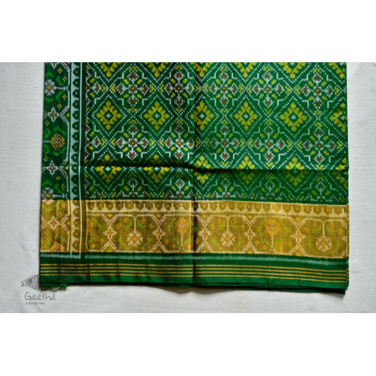 exclusive silk handwoven partola green saree