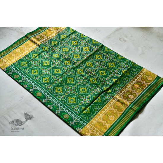 exclusive silk handwoven partola green saree