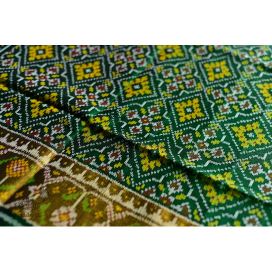 exclusive silk handwoven partola green saree