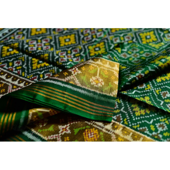 exclusive silk handwoven partola green saree