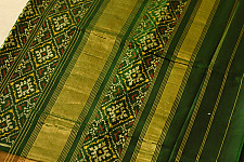 चंपा - चकली ⁂ Handwoven Patola Silk Saree | Green