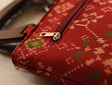 A pocket full of joy | Patola Maroon Handbag