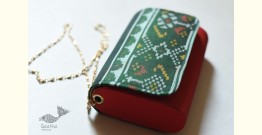 A pocket full of joy | Patola Silk Purse Cum Sling Bag - Green & Red
