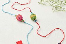 Crochet Rakhi -⚬- Handmade Recyclable Crochet Rakhi Suraj Multicolour Beads (Set of 2)