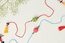 Crochet Rakhi -⚬- Handmade Recyclable Crochet Rakhi Suraj Multicolour Beads (Set of 2)