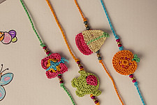 Crochet Rakhi -⚬- Handmade Crochet Rakhi Fun Time (Set of 4)