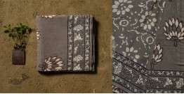 Saanjhh . साँझ | Dabu Block Printed Cotton Saree - Lotus Printed in Grey Color