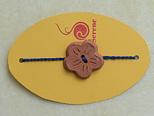 Terracotta ❂ Handmade . Rakhi { e }
