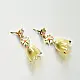 handcrafted pushpa bell jhumka drop earrings featuring a translucent yellow glass bell and white daisy floral stud top   