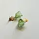 handcrafted sage green glass drop earrings featuring a bell blossom and orb dangle with brass geometric stud tops