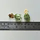 handcrafted sage green glass drop earrings featuring a bell blossom and orb dangle with brass geometric stud tops