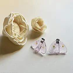 Kusumaprabha . कुसुमांप्रभा ✦ Handmade Glass Pale Pink Moth Earring