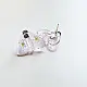 handcrafted translucent pale pink glass moth stud earrings featuring textured grooved wings and yellow spot accents
