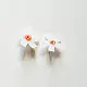 handcrafted shiuli flower glass stud earrings featuring white petaled blooms with vibrant orange center cores   