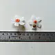 handcrafted shiuli flower glass stud earrings featuring white petaled blooms with vibrant orange center cores   