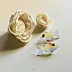 handcrafted glass fish drop earrings featuring yellow and red translucent bodies with delicate light blue fins on hook wires