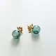 handcrafted deep emerald green glass orb stud earrings crowned with a lotus bud top on brass posts