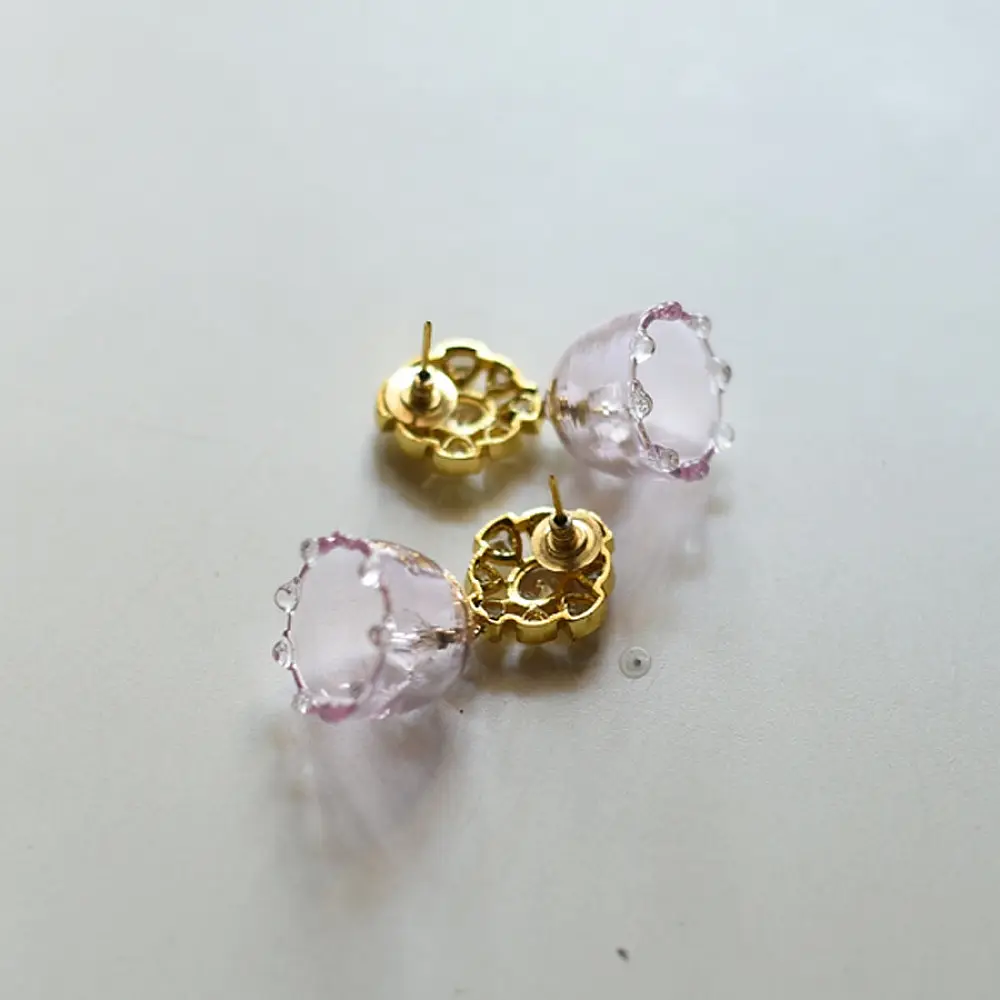 handcrafted mini pink translucent glass bell drop earrings with detailed gold filigree stud tops   
