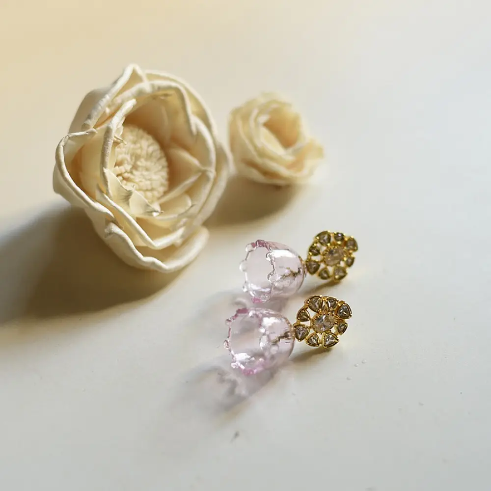 handcrafted mini pink translucent glass bell drop earrings with detailed gold filigree stud tops   