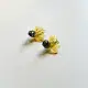 handcrafted translucent amber yellow glass sunflower stud earrings featuring a textured dark beaded center cap