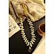 shop online handmade tribal Cowrie And Repurposed Metal Necklace