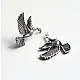 handcrafted german silver bird stud earrings featuring finely detailed spread wings, oxidised finish, and ethnic tribal jewelry design
