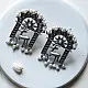 handcrafted german silver arch stud earrings featuring an ornate deer motif, beaded filigree, and dangling faux pearl clusters
