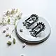 handcrafted german silver arch stud earrings featuring an ornate deer motif, beaded filigree, and dangling faux pearl clusters