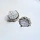 handcrafted german silver circular mandala stud earrings featuring intricate filigree work, scalloped edges, and dangling white pearl ghungroos