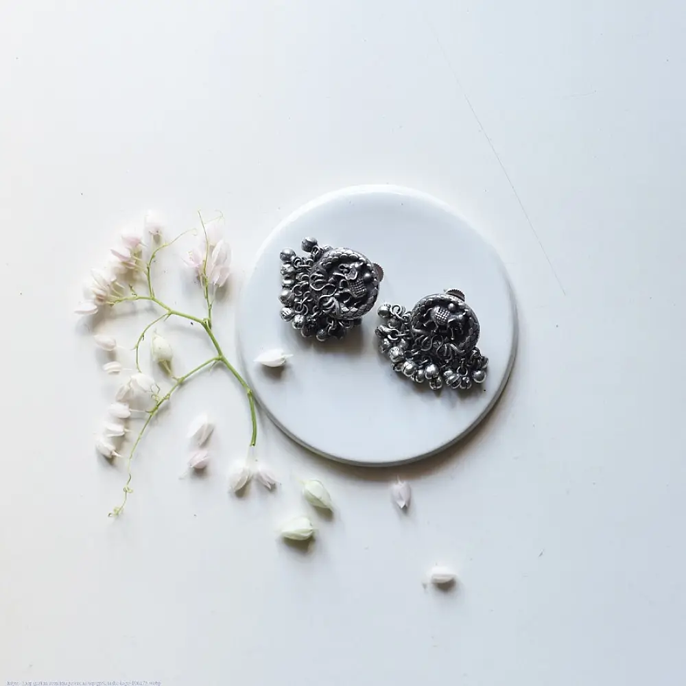 handcrafted german silver jhumka drop earrings featuring elephant motif, filigree stud, dome jhumka, and ghungroo bead fringe