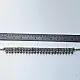 handcrafted german silver choker necklace featuring a central row of textured pyramid spike units, beaded borders, and dangling ghungroo clusters