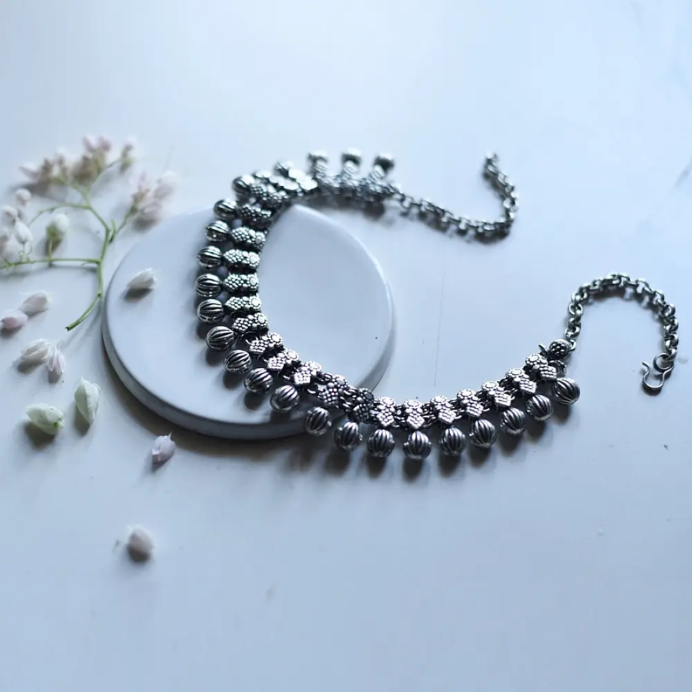 handcrafted german silver dual line choker necklace featuring textured ribbed spherical beads and diamond drop charms in oxidised finish
