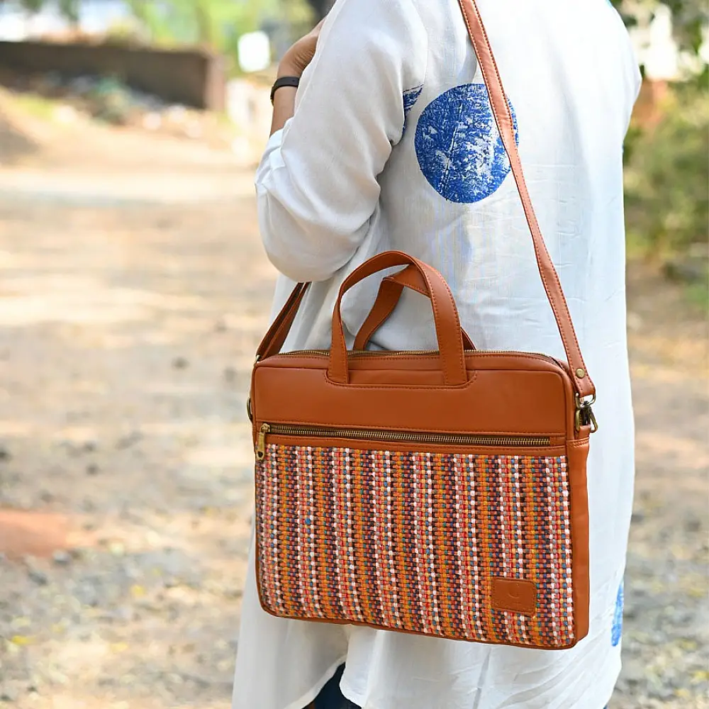 brown Panja Dhurrie laptop bag with multicolour handwoven textile panel and zip closure