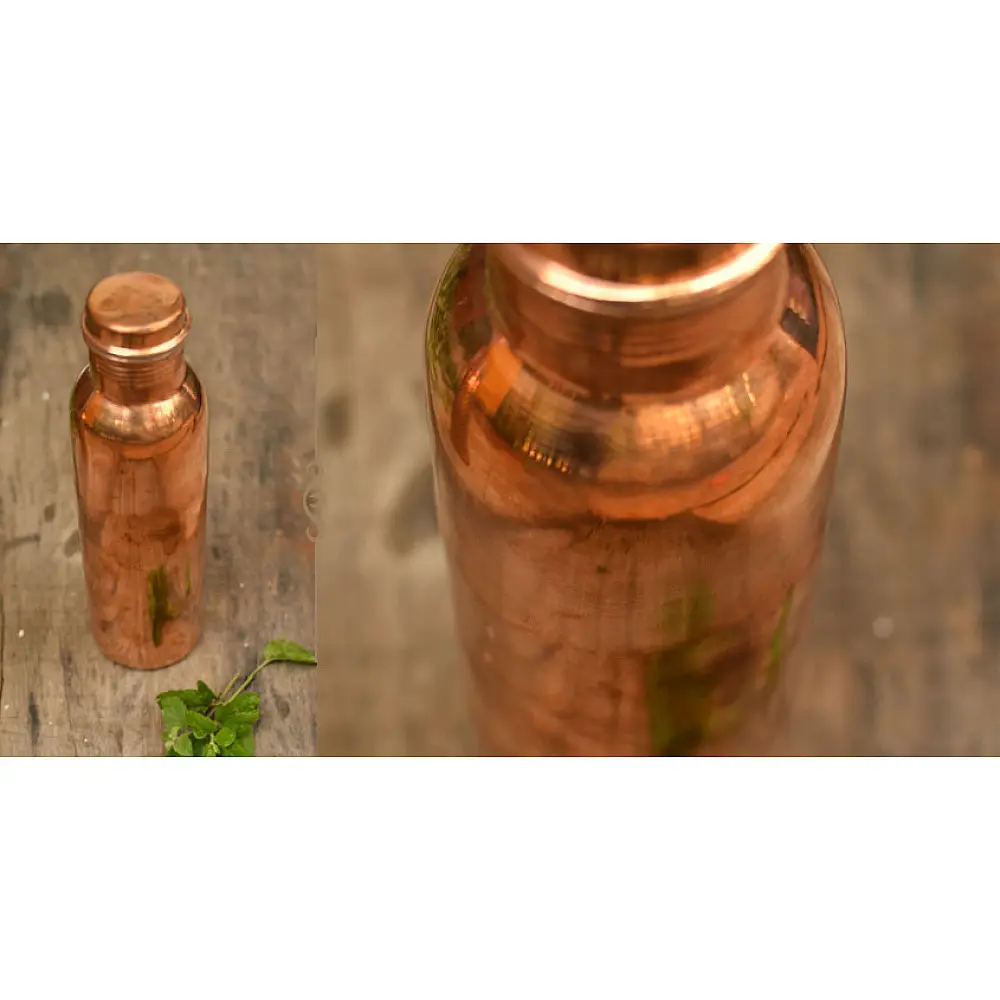 pure copper water bottle with polished finish and rounded lid, 950ml capacity