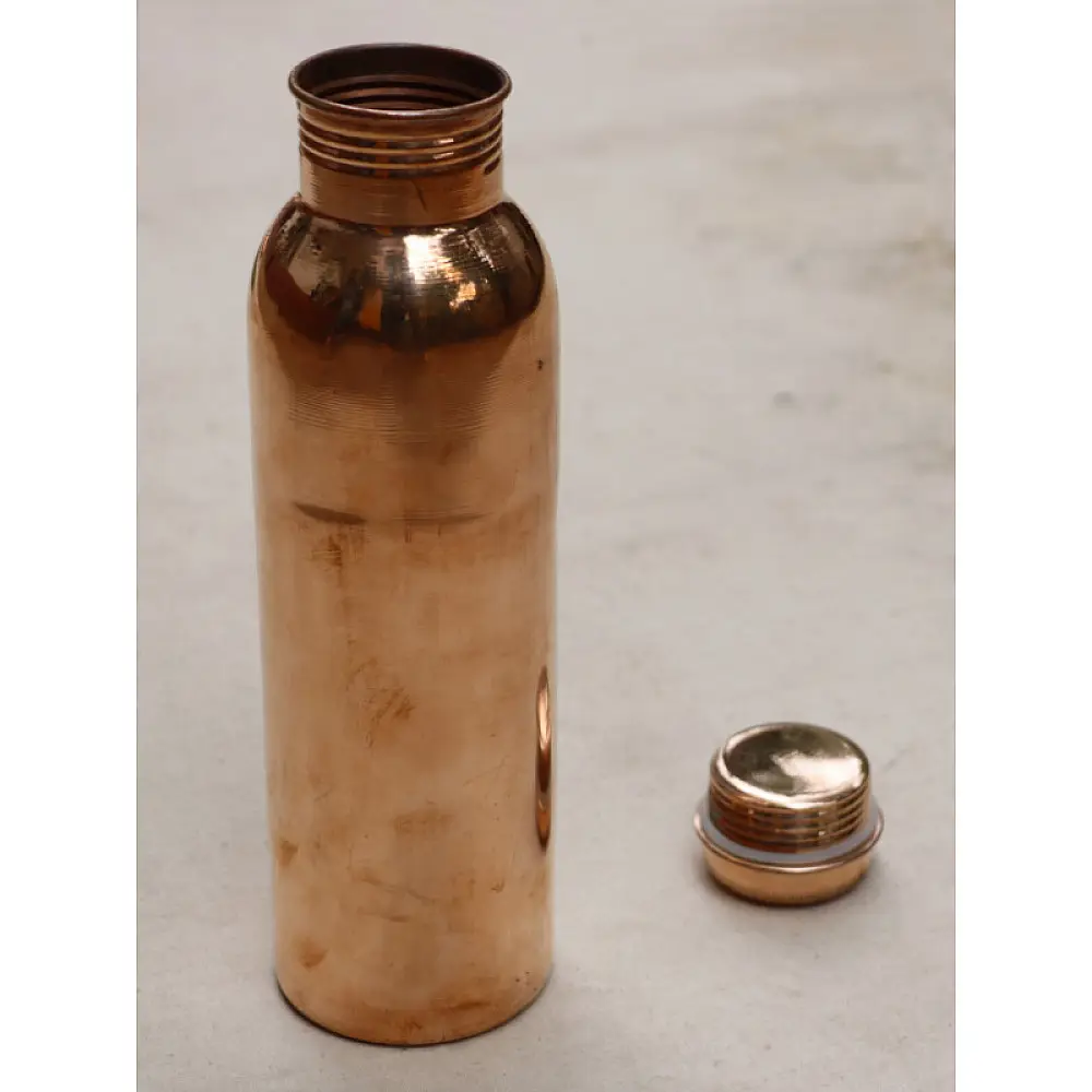 pure copper water bottle with polished finish and rounded lid, 950ml capacity