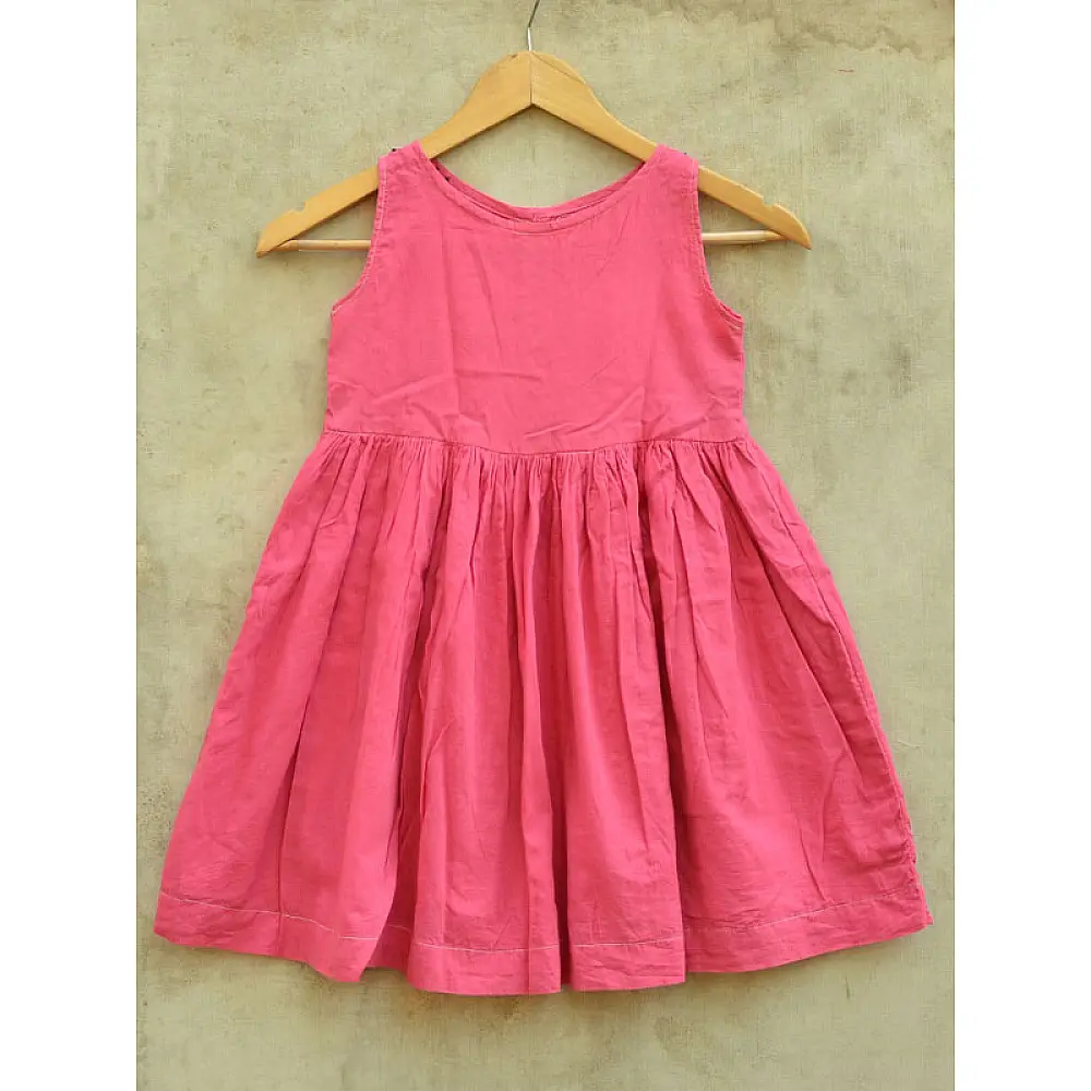 pink pure cotton girls frock with delicate hand embroidered motifs and a gathered skirt