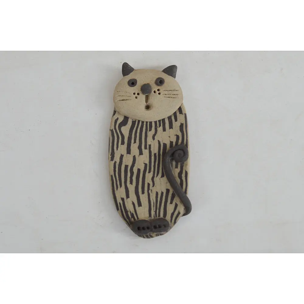 handmade terracotta clay cat fridge magnet with striped body texture and 3D ears and whiskers